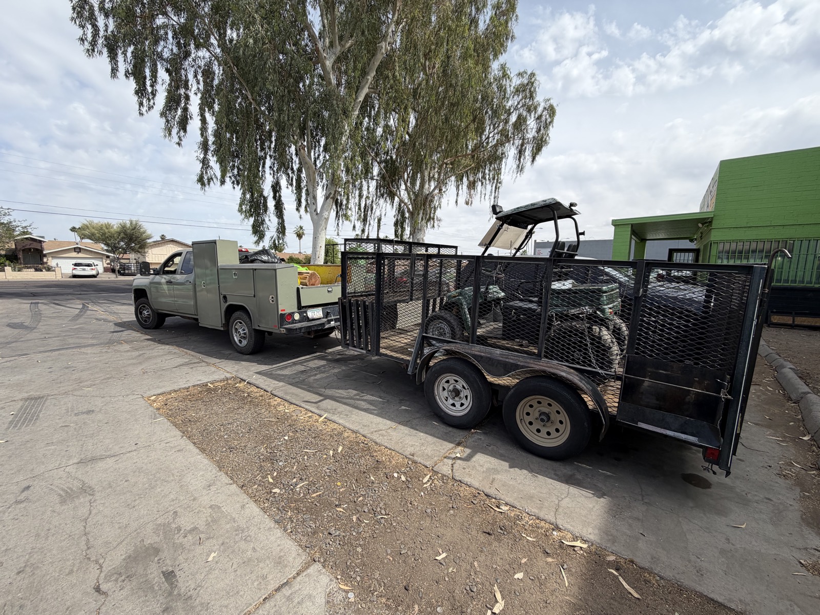 Romero Lawn Care truck and equipment trailer